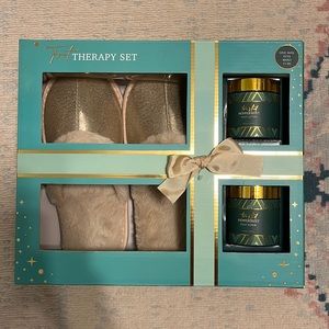 Brand new slipper set with foot lotion and scrub. Size 7-10